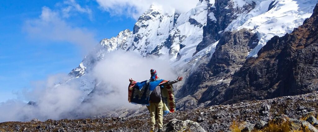 Salkantay Trek to Machu Picchu 3 days — hiker at snow-capped Salkantay Pass from Cusco