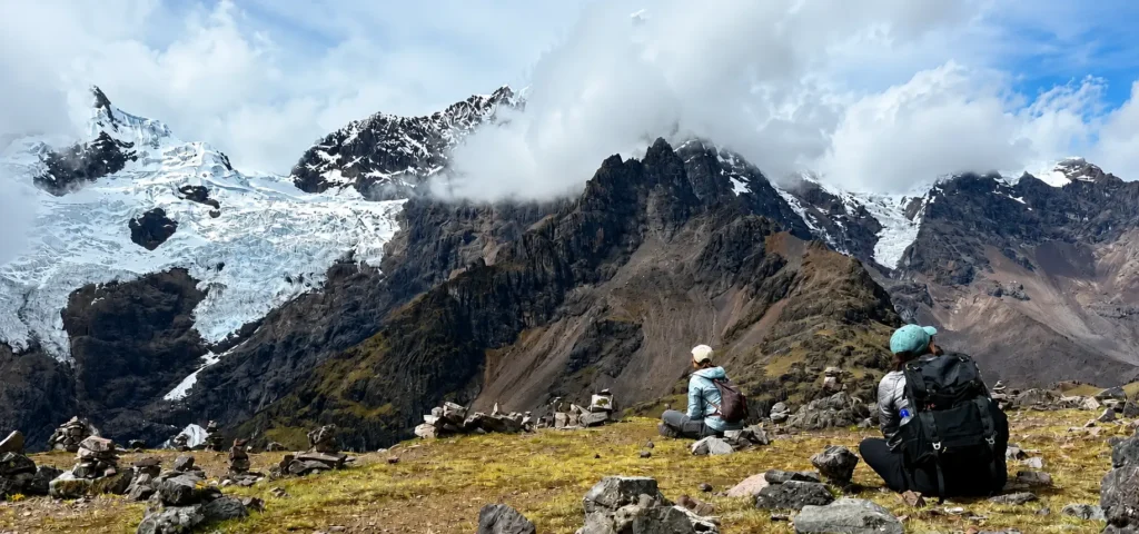 Hikers crossing a mountain pass in the Peruvian Andes