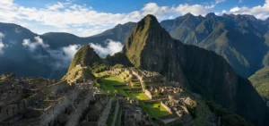 Panoramic view of the Machu Picchu citadel with Huayna Picchu peak rising in the background at sunrise