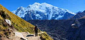 Salkantay Trek 5 days - hiker approaching the Salkantay Pass at 4,630 m (15,190 ft) from Cusco